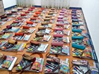 توزیع نوشت افزار بین دانش آموزان توکهور و هشتبندی میناب